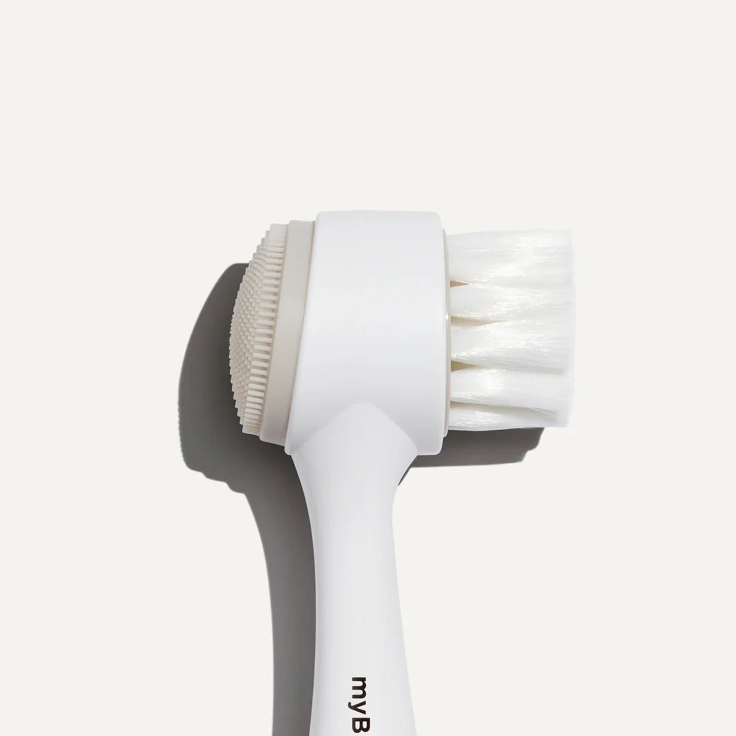 dual-action cleansing brush