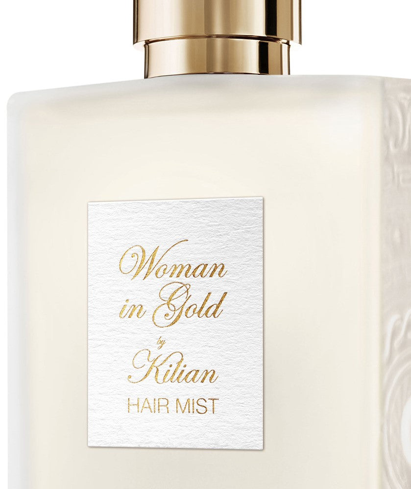Woman In Gold Hair Mist